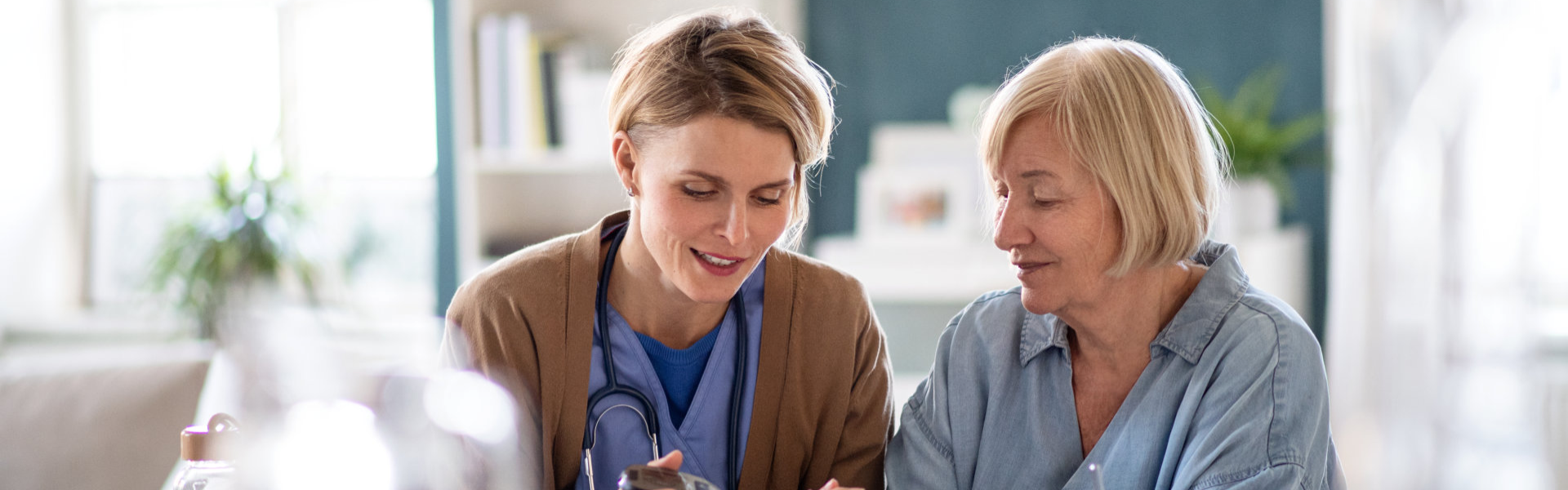 Caregiver checking elderly